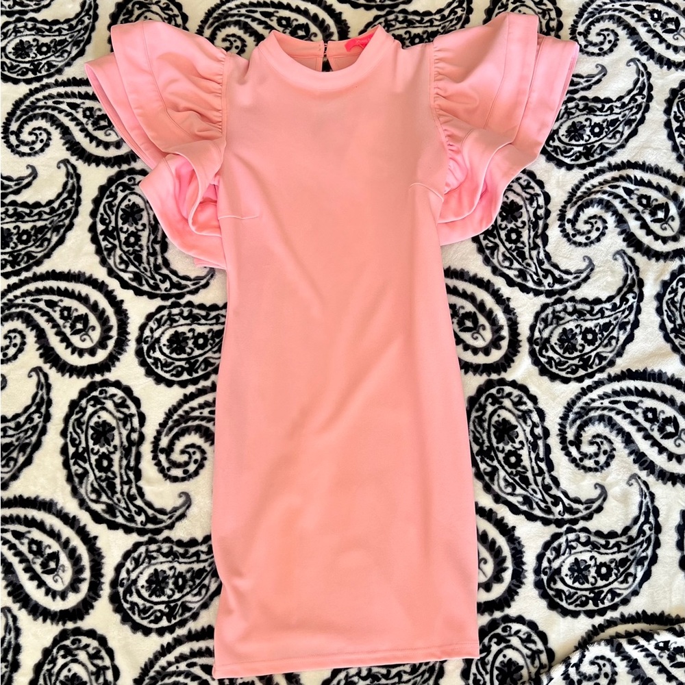 Pink dress with ruffled sleeves